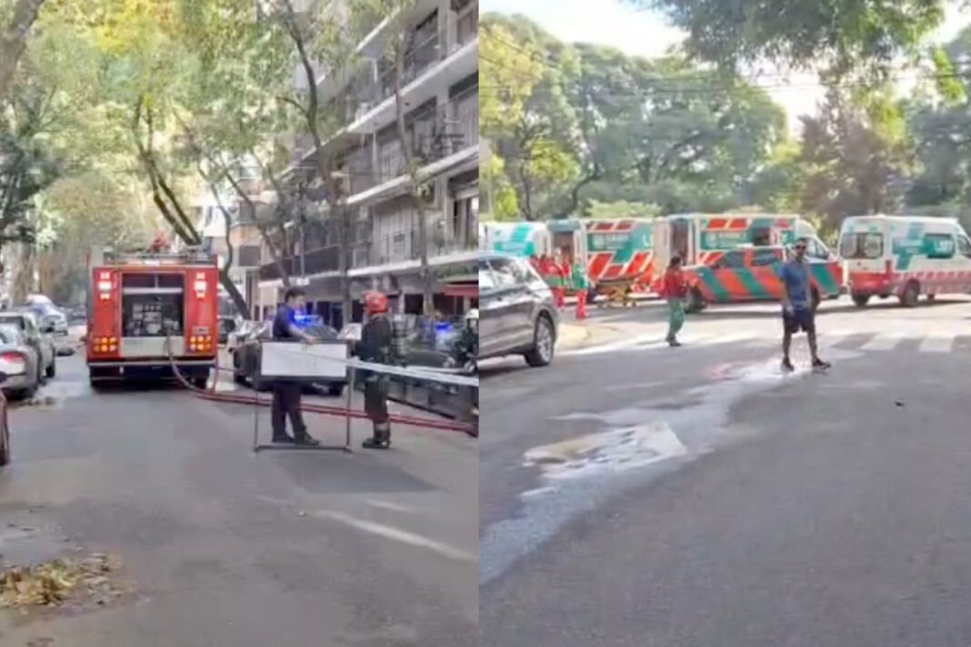 Bomberos y ambulancias trabajando frente a un hotel en Palermo tras un incendio en el sauna