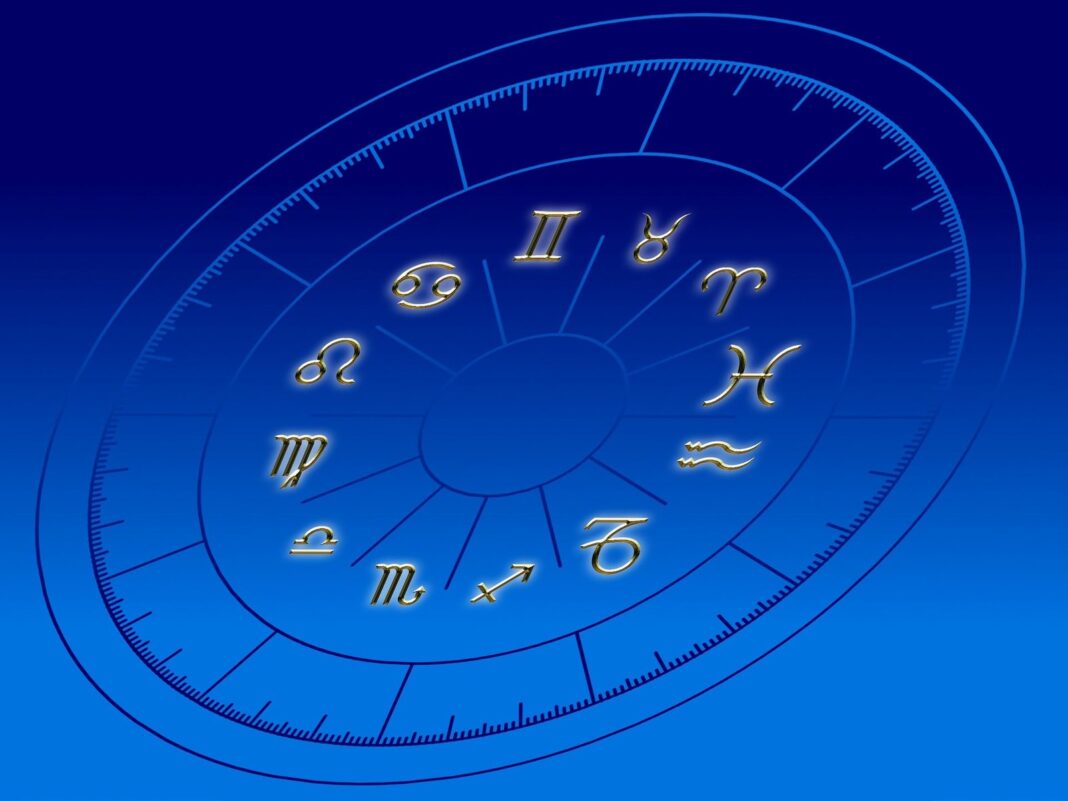 Ilustración de los signos del zodíaco con fondo estelar