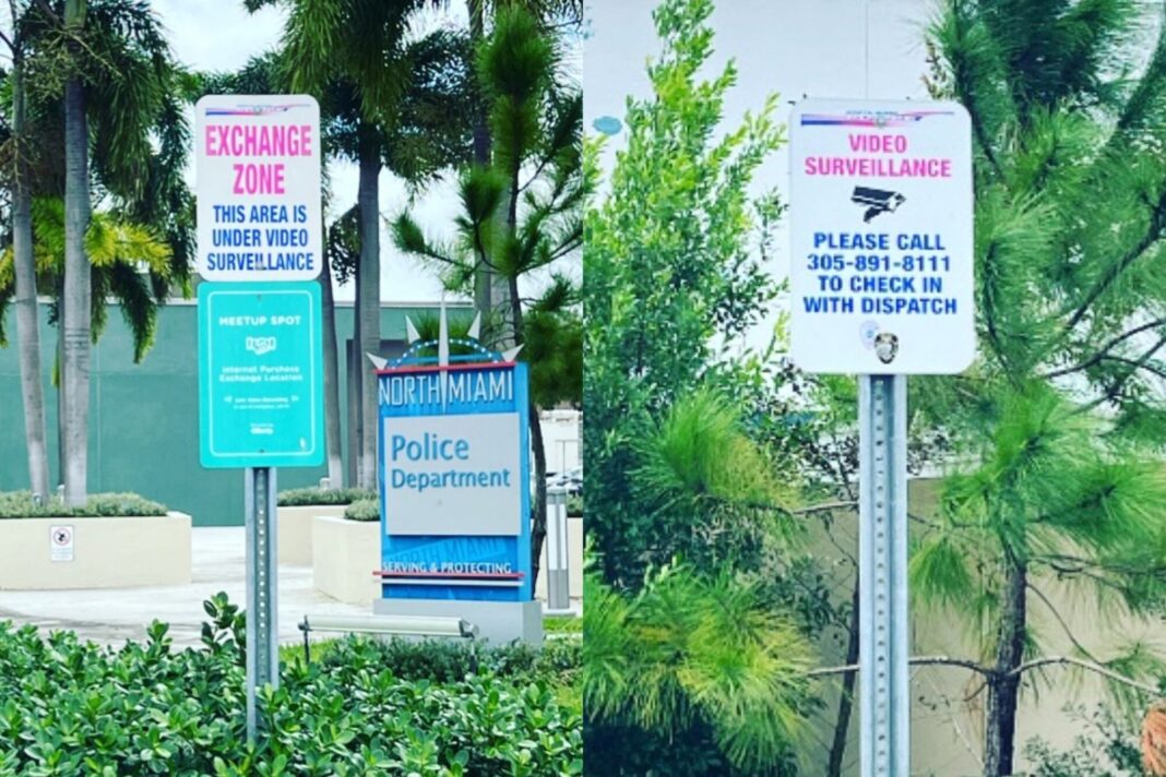Estacionamiento vigilado de una estación policial en Miami-Dade señalizado como zona de intercambio seguro