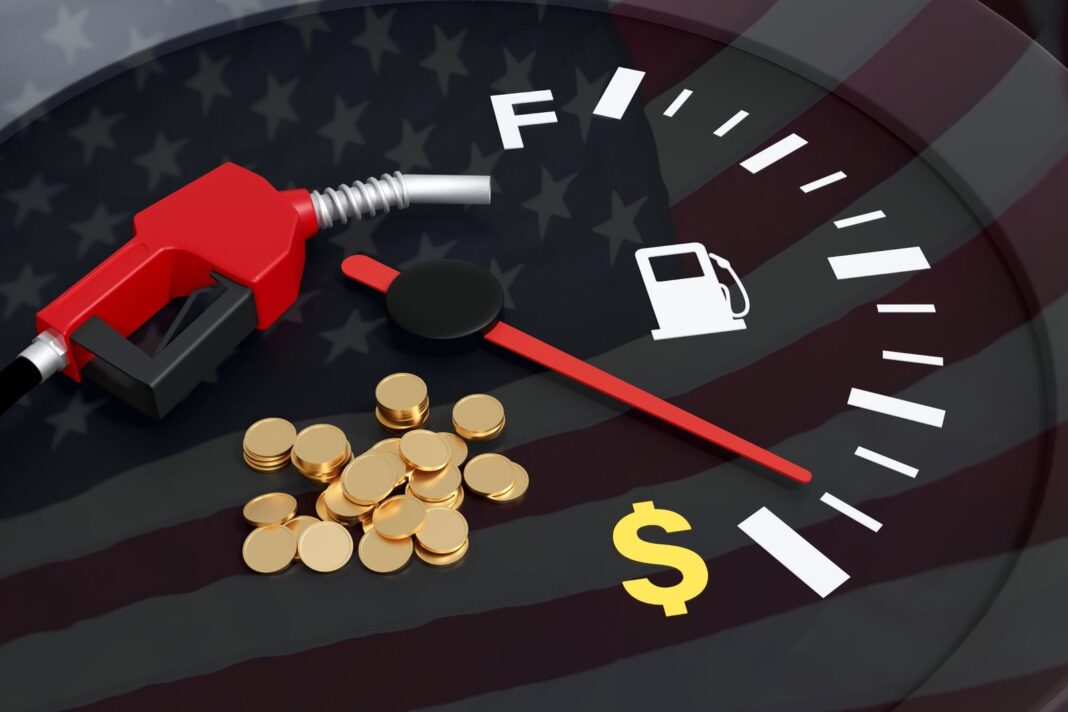 Estación de servicio en Illinois con cartel de precios de combustible