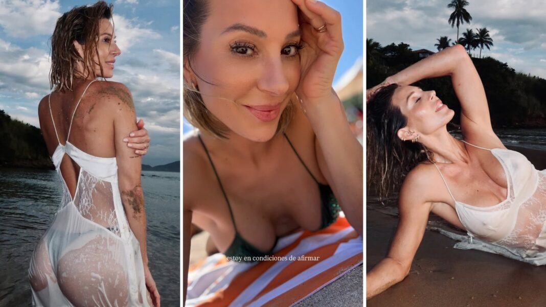 Noelia Marzol en la playa de Geribá, Brasil, con vestido blanco transparente mojado
